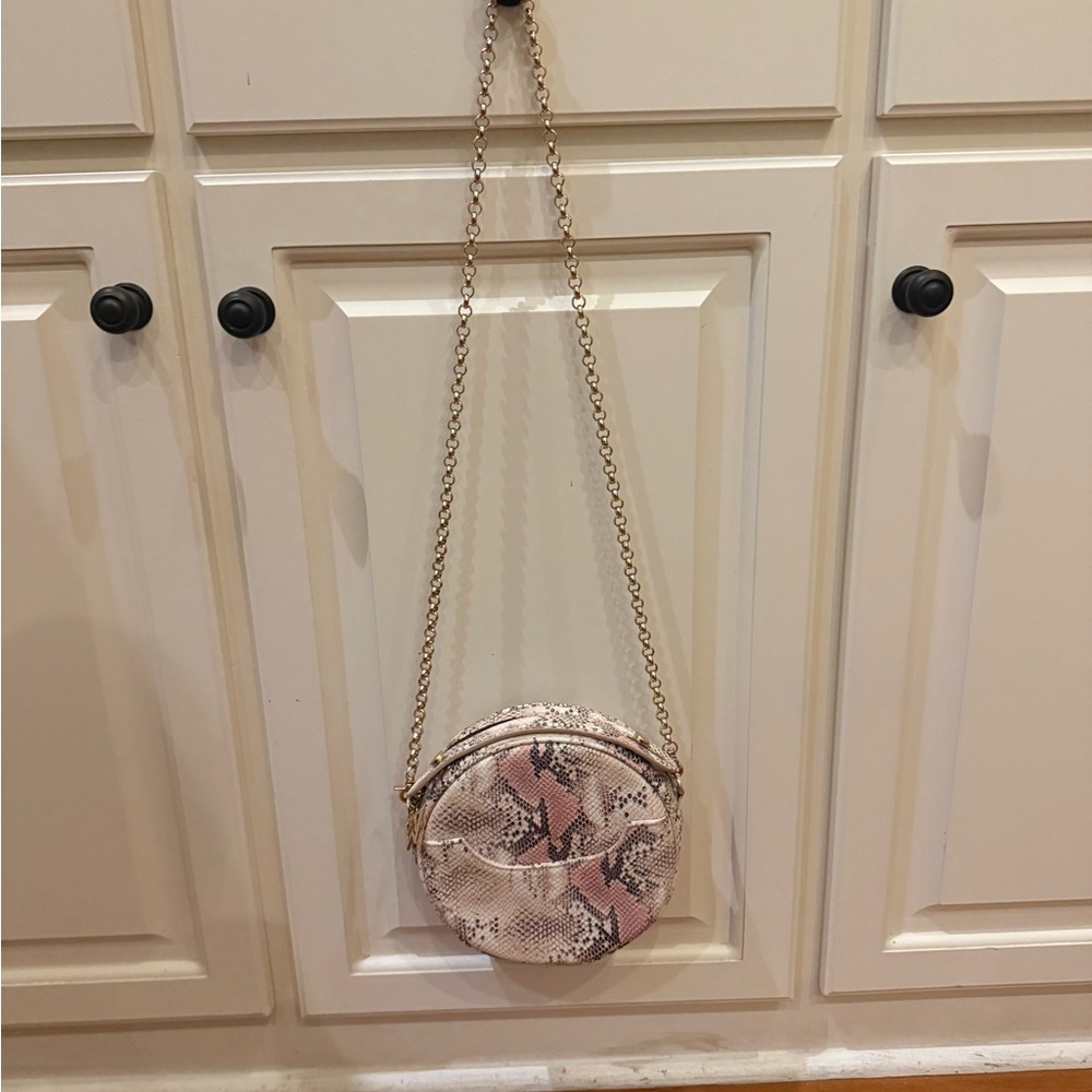 Kelly Wynne Pink and Cream Snake Skin Print Round Crossbody Bag - Picture 4 of 5